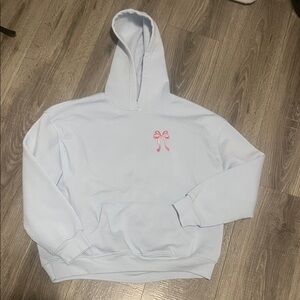 Girls size L baby blue hoody with pink bows